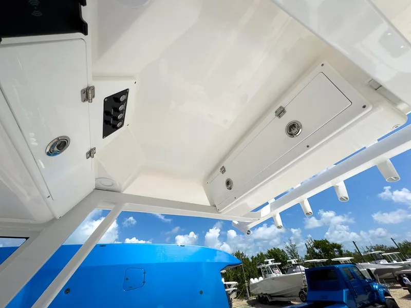 Slide: The Image of 2025 Sea Fox 248 Commander boat interior storage compartments and rod holders. - 15
