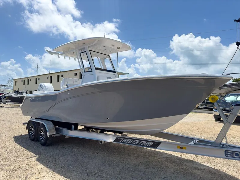 Slide: The Image of 2025 Sea Fox 248 Commander boat on trailer under clear sky. - 6