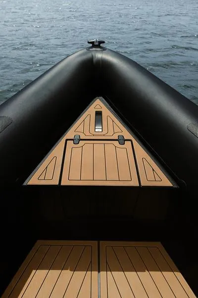 Slide: The Image of Roughneck 1010 boat deck, 2022 model, on calm water. - 15
