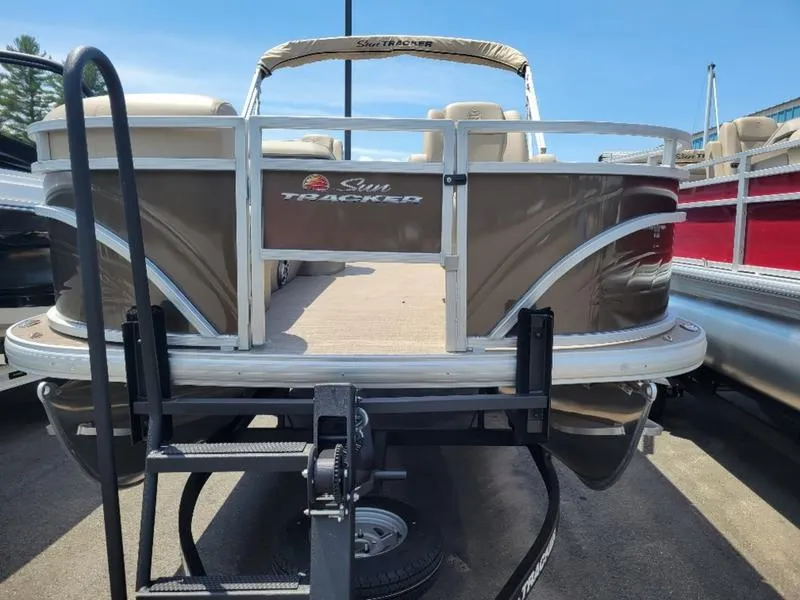 Slide: The Image of 2025 Sun Tracker SF 20 DLX pontoon boat on trailer, rear view. - 3
