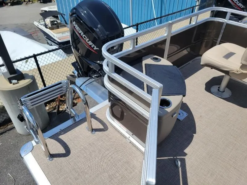 Slide: The Image of 2025 Sun Tracker SF 20 DLX pontoon boat with Mercury outboard motor. - 8