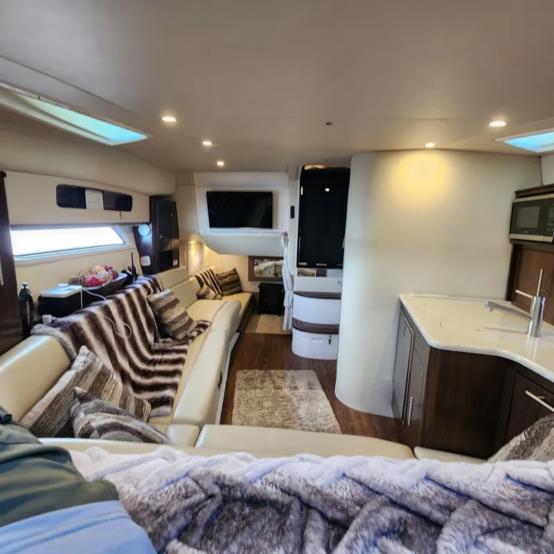 Slide: The Image of Interior of a 2018 Regal 35 Sport Coupe yacht with modern furnishings. - 32