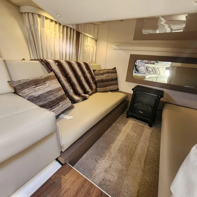 Slide: The Image of Interior of 2018 Regal 35 Sport Coupe with cozy seating and modern decor. - 34