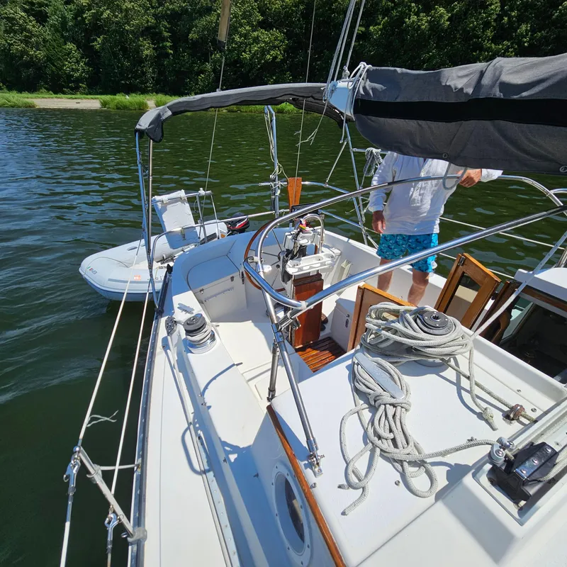Slide: The Image of 1986 Nautilus Pilothouse 36 sailboat on calm water, featuring deck and rigging details. - 44
