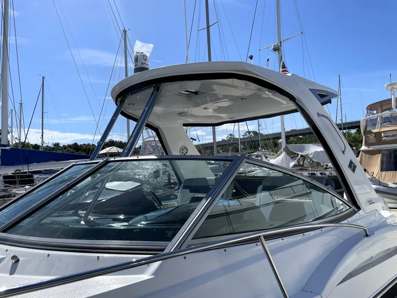 Slide: The Image of 2020 Monterey 345 Sport Yacht docked, showcasing sleek design and modern features. - 14