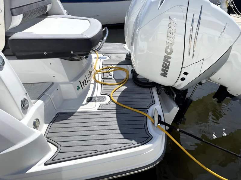Slide: The Image of 2020 Monterey 345 Sport Yacht with Mercury engine, docked with yellow power cable. - 18