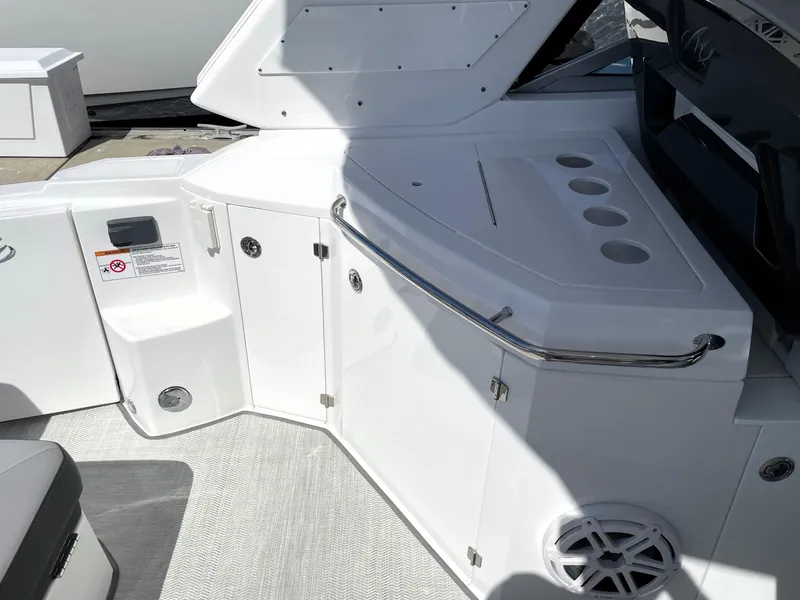 Slide: The Image of 2020 Monterey 345 Sport Yacht interior with sleek white cabinetry and modern design. - 28