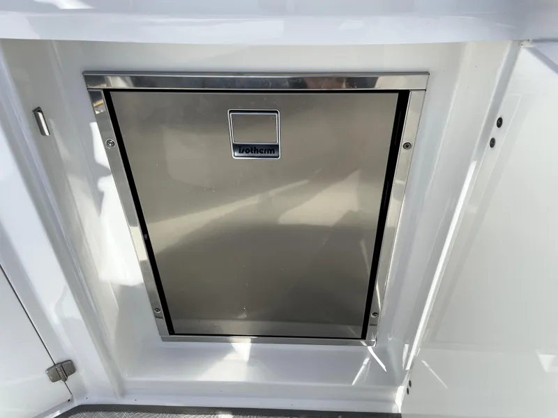 Slide: The Image of Stainless steel hatch on 2020 Monterey 345 Sport Yacht, featuring Isotherm cooler. - 30