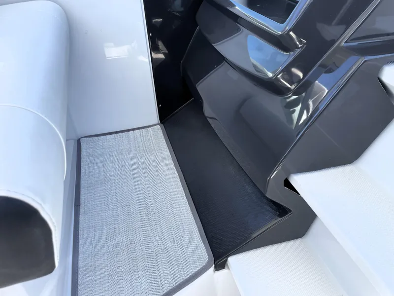 Slide: The Image of Interior view of 2020 Monterey 345 Sport Yacht steps and seating area. - 36