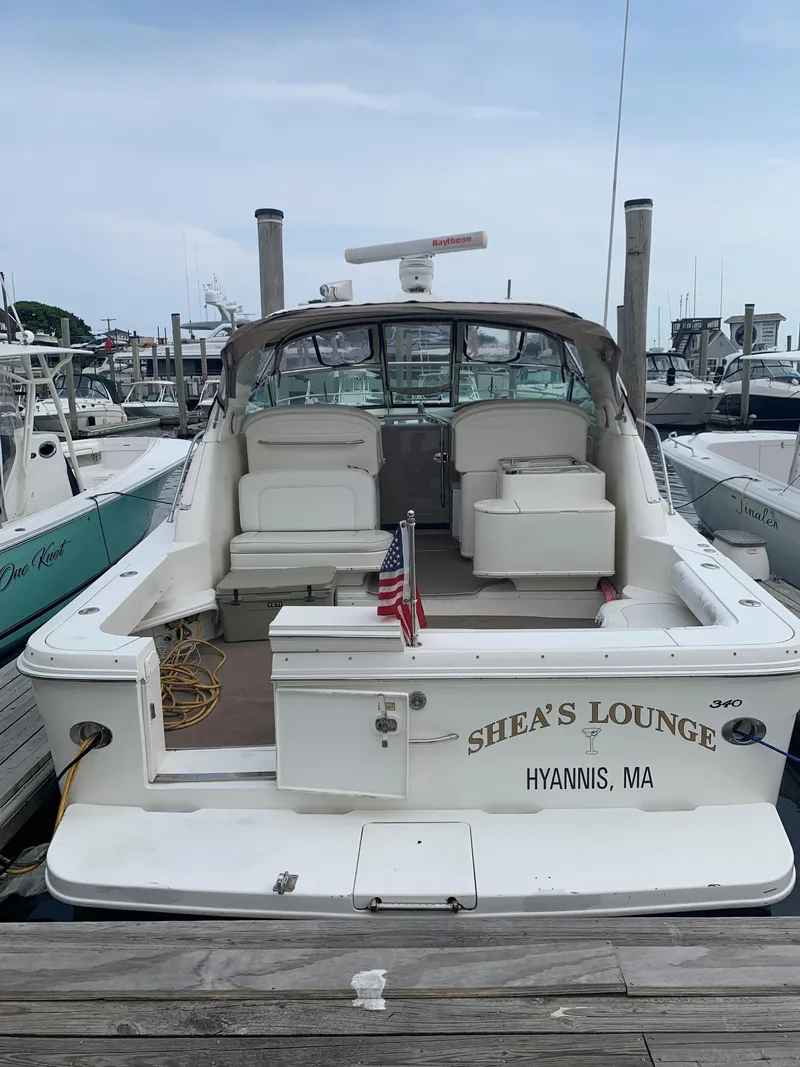 Slide: The Image of 2001 Sea Ray 340 Amberjack docked at marina, named Shea's Lounge, Hyannis, MA. - 3