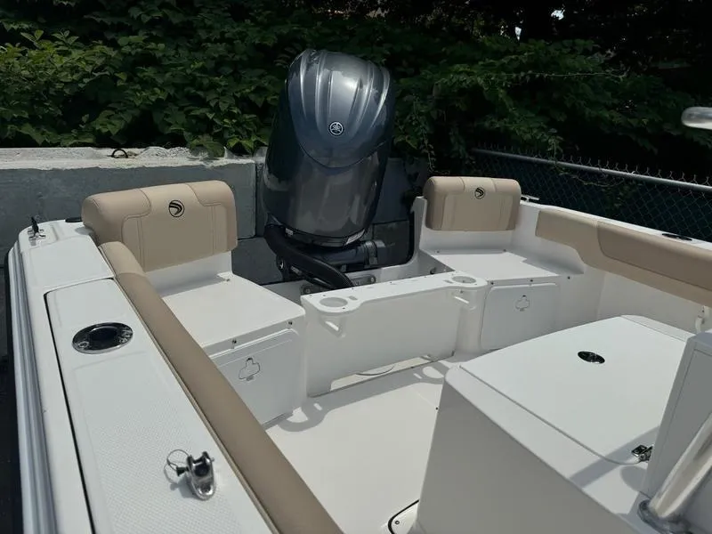 Slide: The Image of 2025 Edgewater 188 CC boat with outboard motor and seating area. - 4