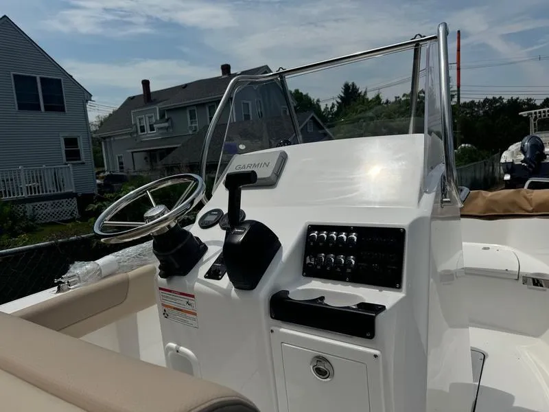 Slide: The Image of 2025 Edgewater 188 CC boat console with Garmin navigation system. - 5