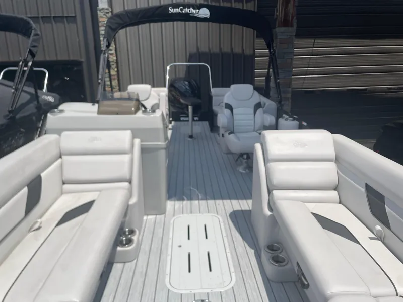 Slide: The Image of 2024 SunCatcher Select 324RC pontoon boat with spacious seating and modern design. - 6