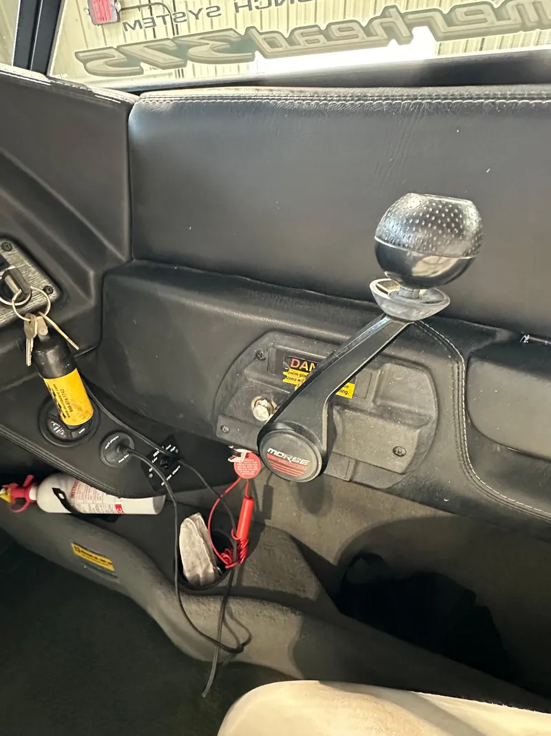 Slide: The Image of Interior controls of a 2003 Malibu Wakesetter 23 XTi boat. - 5