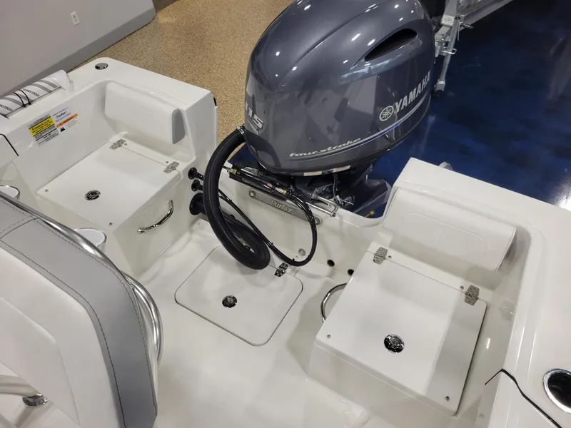 Slide: The Image of 2025 Parker 18 SE CC boat with Yamaha outboard motor, interior view. - 9
