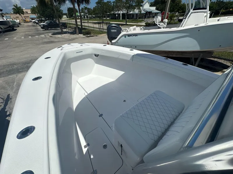 Slide: The Image of 2025 Blue Water 23T CC boat with spacious seating and sleek design. - 6