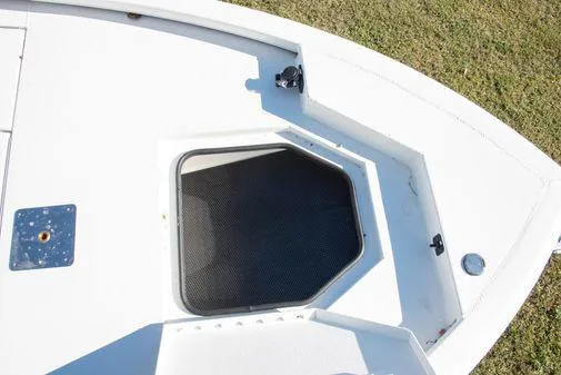 Slide: The Image of 2024 Avid 21 FSX boat deck with storage compartment. - 18