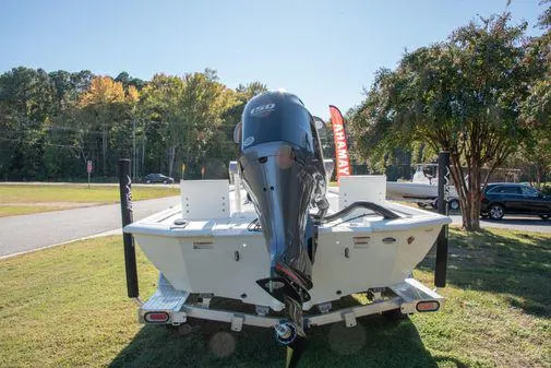 Slide: The Image of 2024 Avid 21 FSX boat with Yamaha outboard motor, rear view. - 4