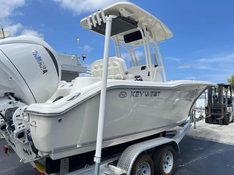 Slide: The Image of 2025 Key West 244 CC boat on trailer with Yamaha engine. - 13