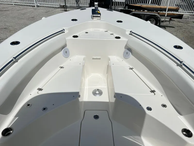 Slide: The Image of 2025 Key West 244 CC boat interior, spacious seating and storage. - 15