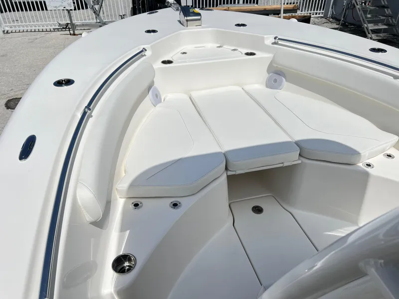 Slide: The Image of 2025 Key West 244 CC boat with spacious seating and sleek design. - 19