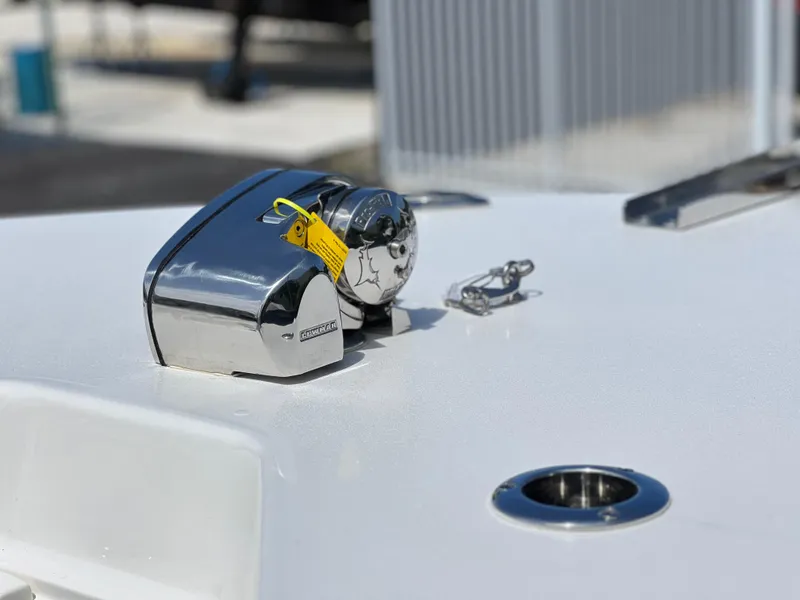 Slide: The Image of 2025 Key West 244 CC boat deck with chrome anchor winch. - 25