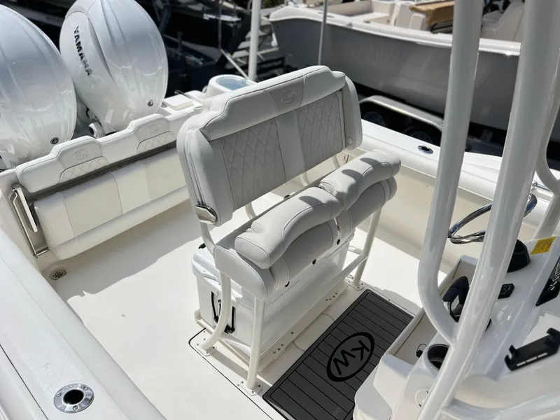Slide: The Image of 2025 Key West 244 CC boat interior with dual Yamaha engines. - 32