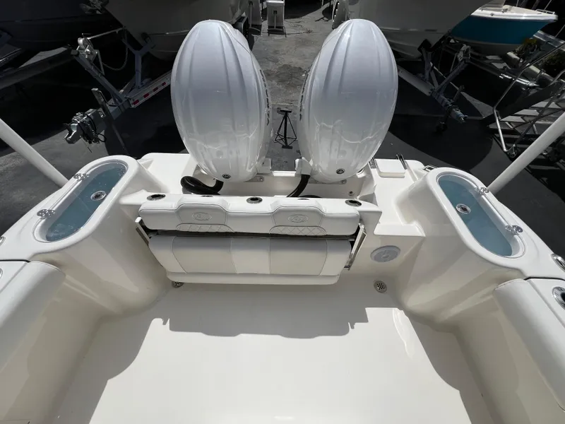 Slide: The Image of 2025 Key West 244 CC boat with dual outboard engines and spacious deck. - 41