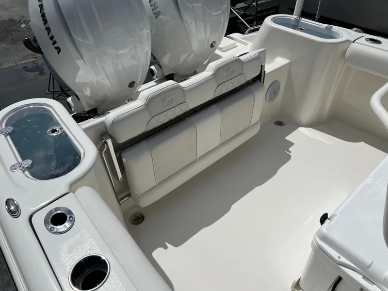 Slide: The Image of 2025 Key West 244 CC boat interior with dual Yamaha engines and seating. - 42