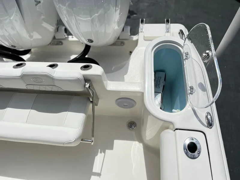 Slide: The Image of 2025 Key West 244 CC boat interior with seating and storage compartment. - 45