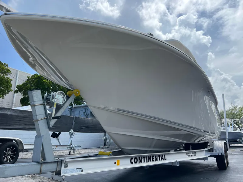 Slide: The Image of 2025 Key West 244 CC boat on Continental trailer, side view. - 5