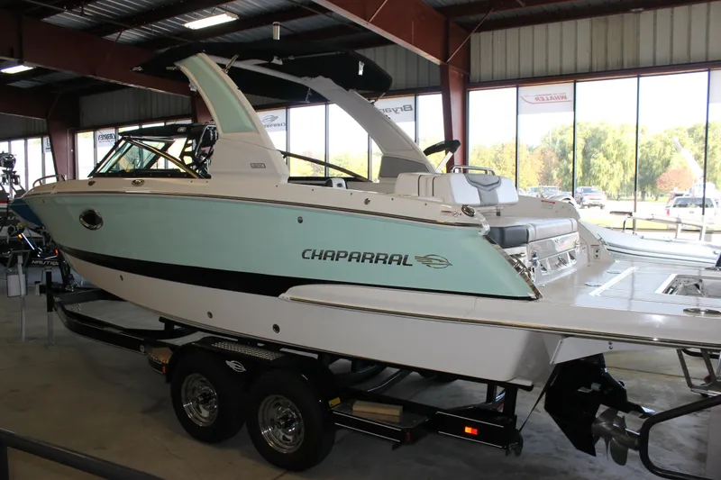 Slide: The Image of 2020 Chaparral 257 SSX boat on trailer in indoor showroom. - 3