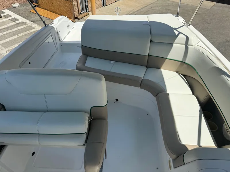 Slide: The Image of 2001 Cobalt 25 LS boat interior with white and gray seating. - 20