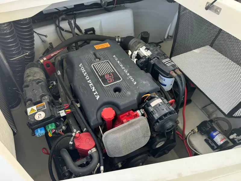 Slide: The Image of Engine compartment of a 2001 Cobalt 25 LS boat with Volvo Penta engine. - 26