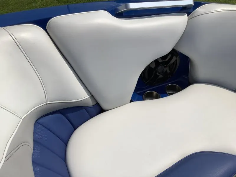 Slide: The Image of Interior seating of a 2016 MB B52 23 boat with white and blue upholstery. - 17