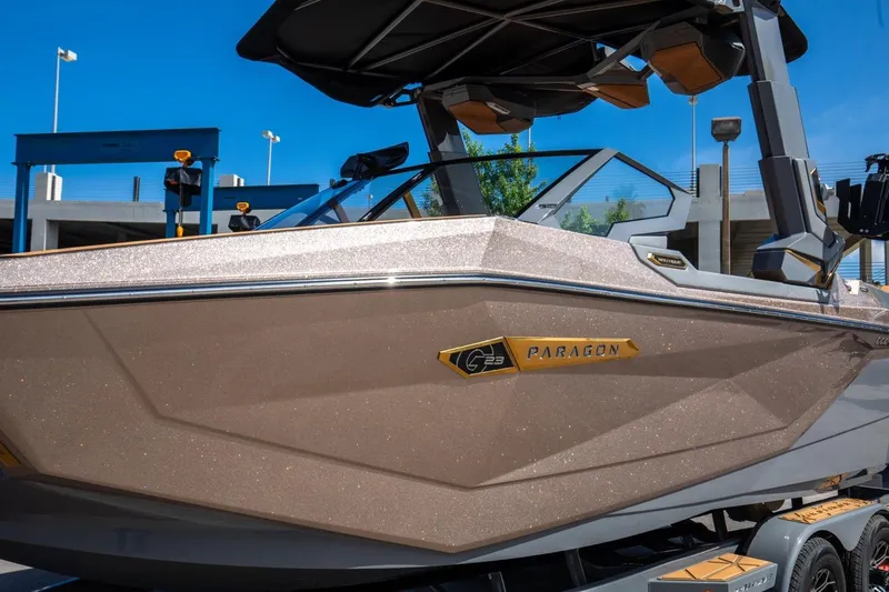 Slide: The Image of 2024 Nautique G23 Paragon boat with sleek design and modern features. - 15