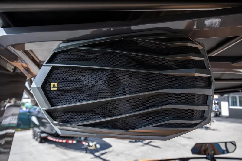 Slide: The Image of 2024 Nautique G23 boat speaker system close-up. - 21