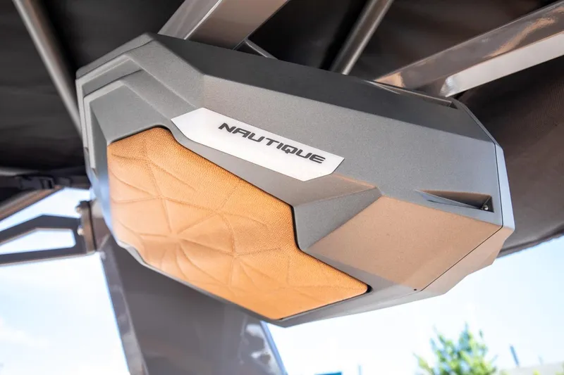 Slide: The Image of 2024 Nautique G23 boat speaker detail with modern design. - 34