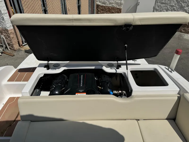 Slide: The Image of 2019 Regal 1900 ES Bowrider with open engine compartment. - 19