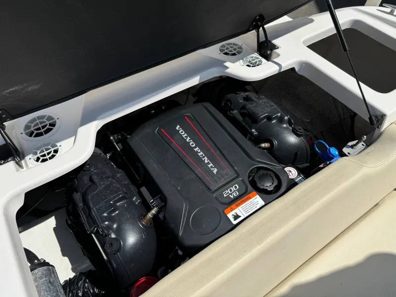 Slide: The Image of 2019 Regal 1900 ES Bowrider engine compartment with Volvo Penta 200 V6 motor. - 20