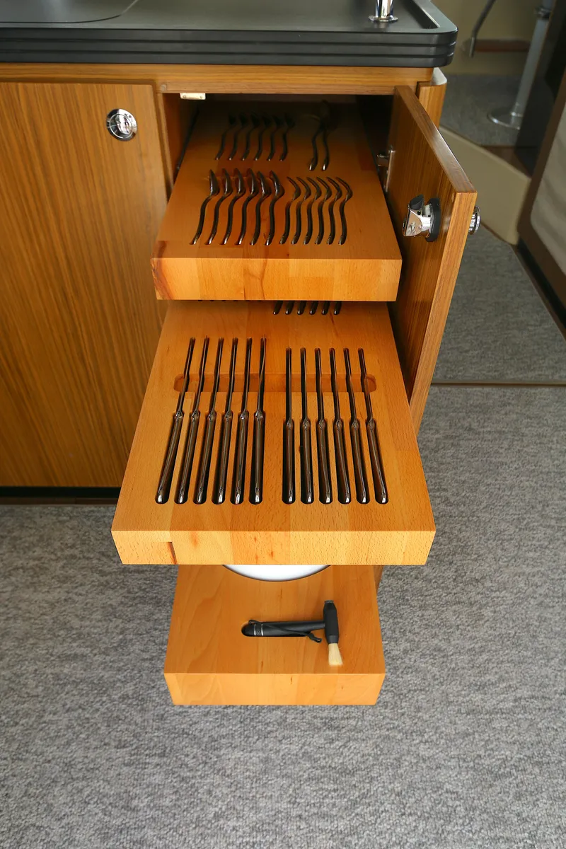 Slide: The Image of Cutlery drawer in 2014 Azimut Magellano 43 yacht, showcasing organized utensils. - 14