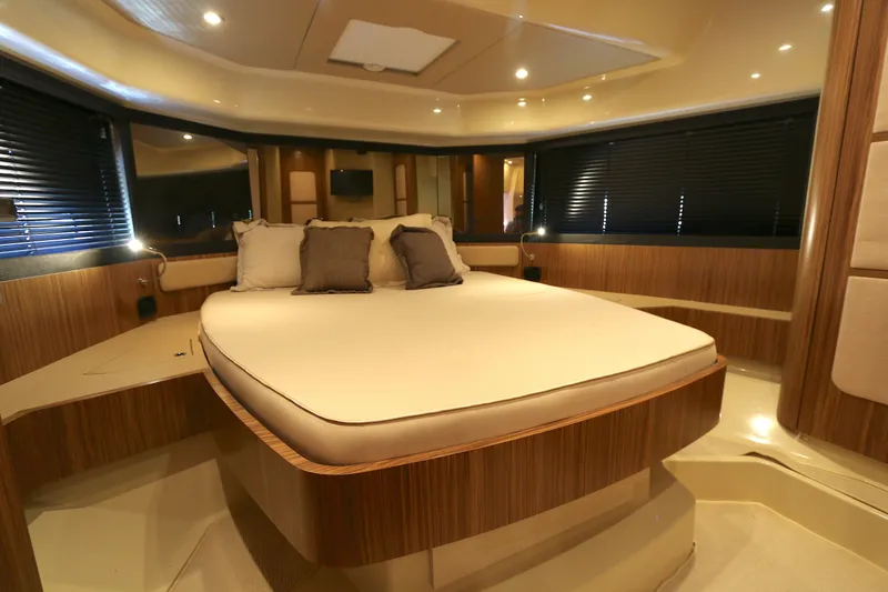 Slide: The Image of Luxurious bedroom interior of 2014 Azimut Magellano 43 yacht with elegant wood finishes. - 6