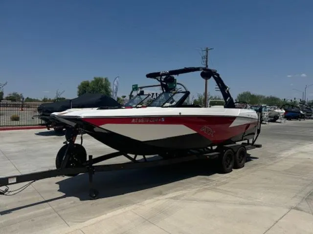 Slide: The Image of 2020 ATX Boats 24 TYPE-S on trailer in parking lot. - 6