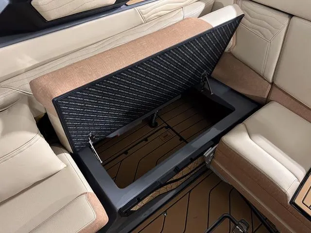 Slide: The Image of 2025 Nautique Super Air Nautique G23 interior storage compartment. - 14