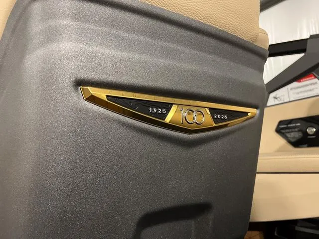 Slide: The Image of 2025 Nautique Super Air Nautique G23 interior, 100th anniversary emblem. - 25