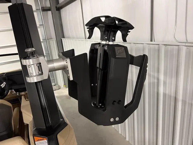 Slide: The Image of 2025 Nautique Super Air Nautique G23 wakeboard rack in a storage facility. - 39