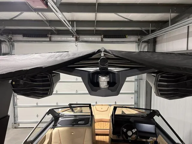 Slide: The Image of 2025 Nautique Super Air Nautique G23 interior with advanced sound system. - 40