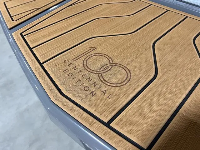 Slide: The Image of 2025 Nautique Super Air Nautique G23 Centennial Edition teak deck. - 8