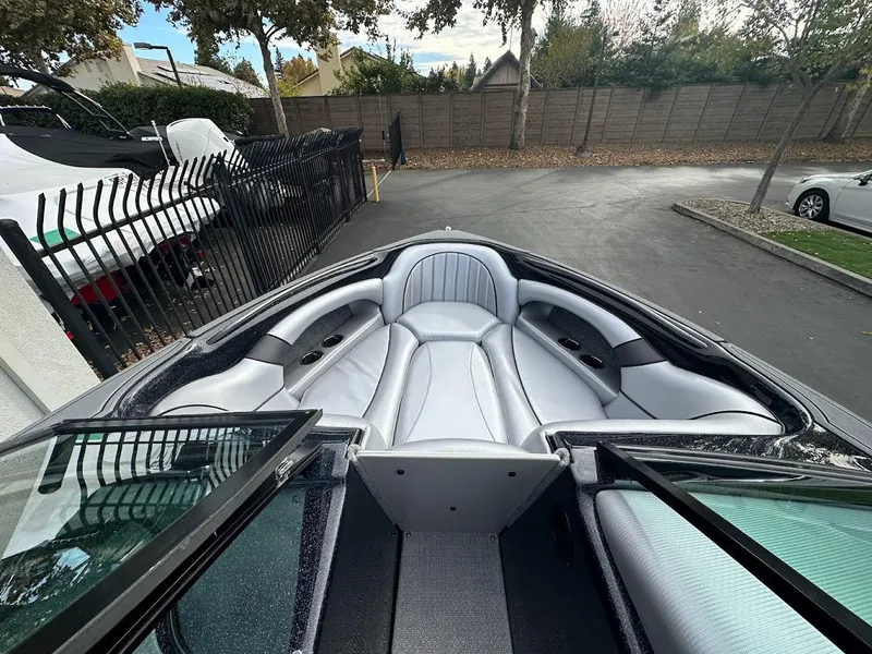 Slide: The Image of 2024 Sanger V237 SX boat interior with sleek, modern seating design. - 13