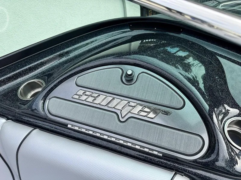 Slide: The Image of 2024 Sanger V237 SX boat dashboard with logo and sleek design. - 21